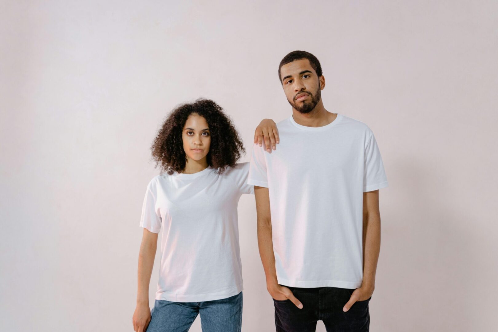 A man and woman standing next to each other.